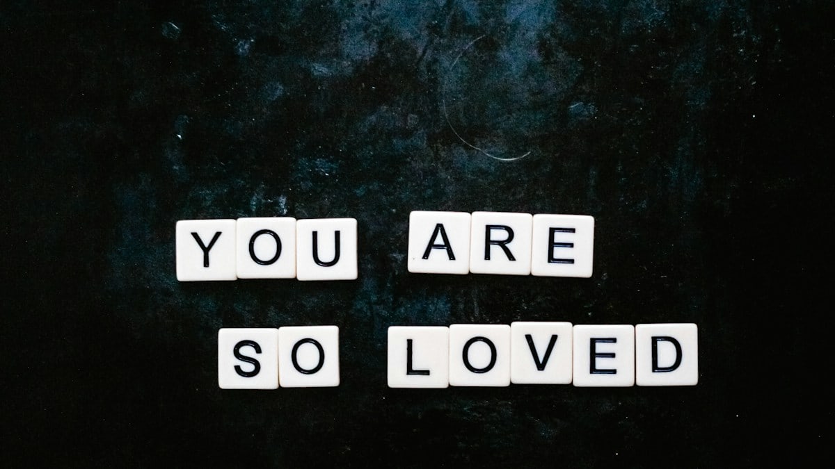 You are so loved spelt out using Scrabble letters flatlay